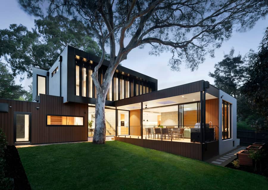 A modern house with warm interior light